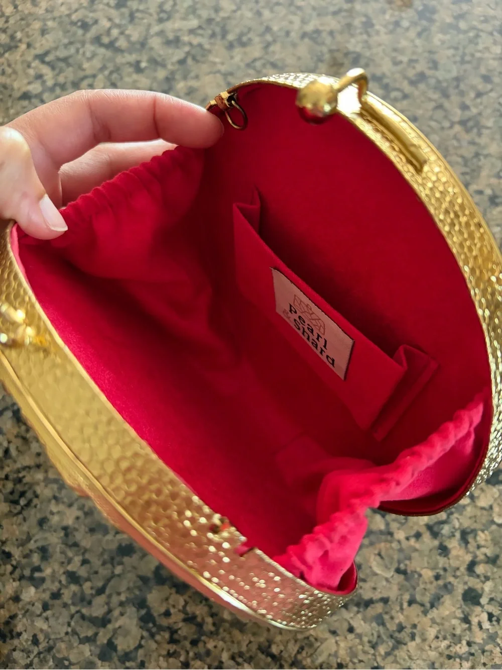 Round Gold Lion Relief Clutch