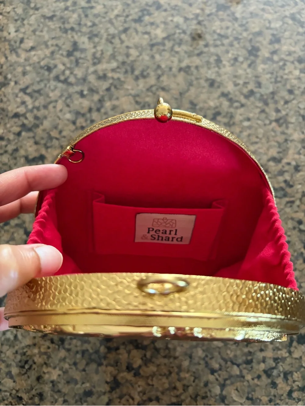 Round Gold Lion Relief Clutch