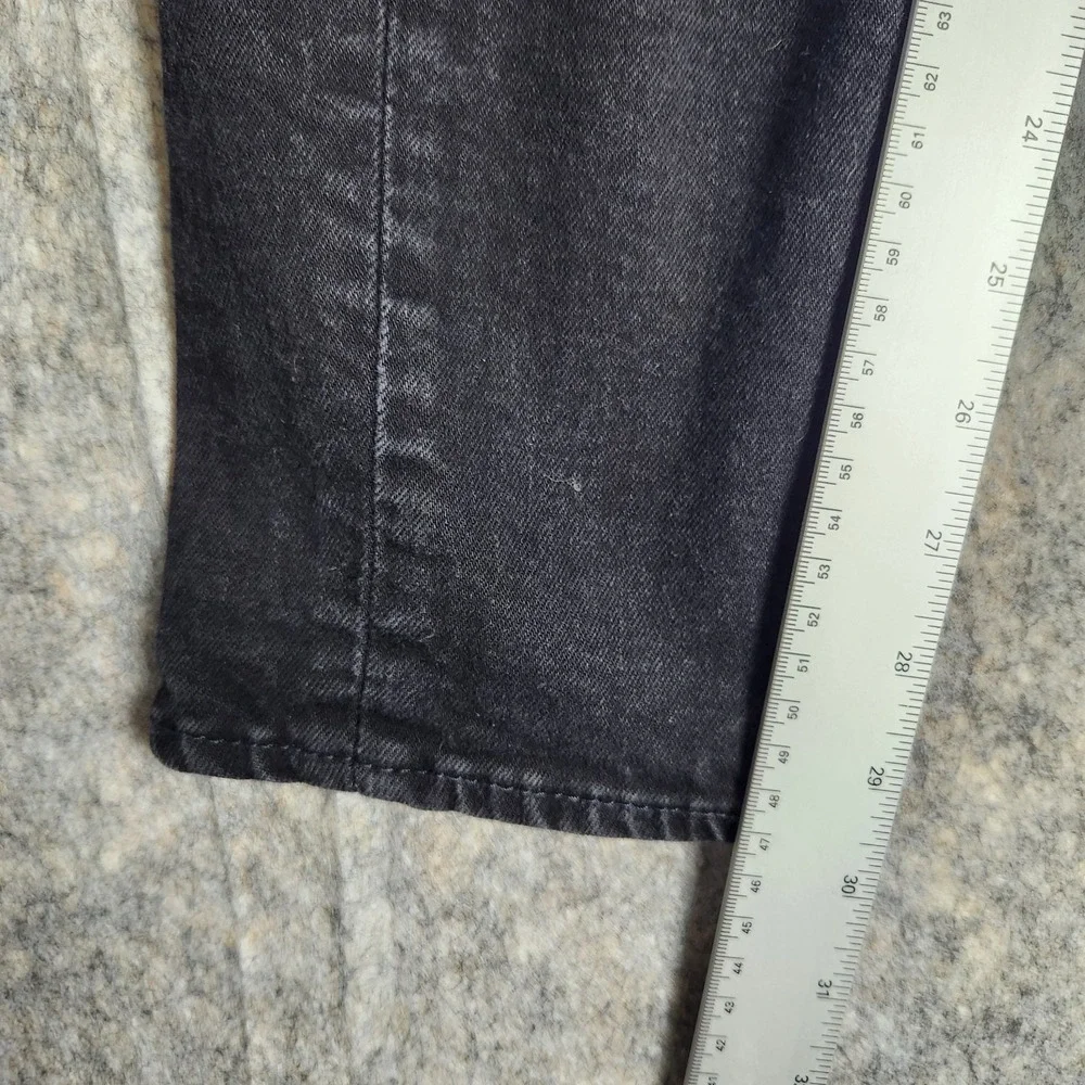 Levis tears waist rips