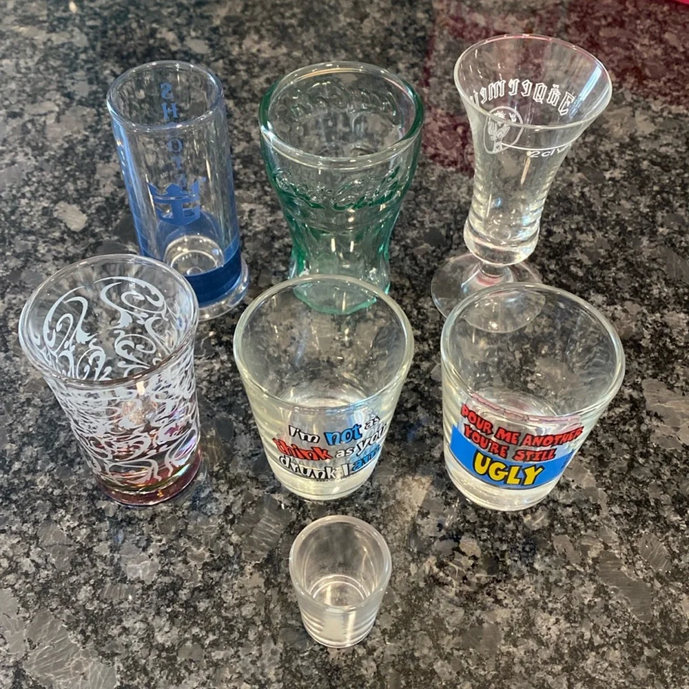 Collection of 7 glass shot glasses, various sizes, and designs Bar accessories