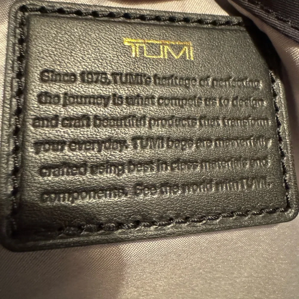 Tumi stock gold