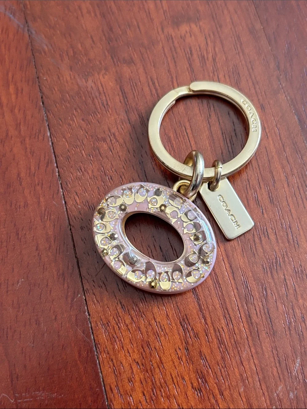 Coach Gold-Tone Keyring with Pink Crystal Oval Charm