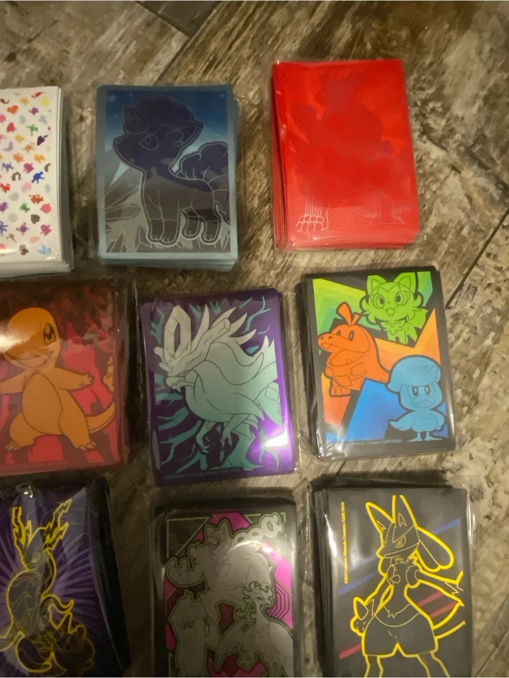Assorted Pokémon Card Sleeve packs- Multi Color Designs