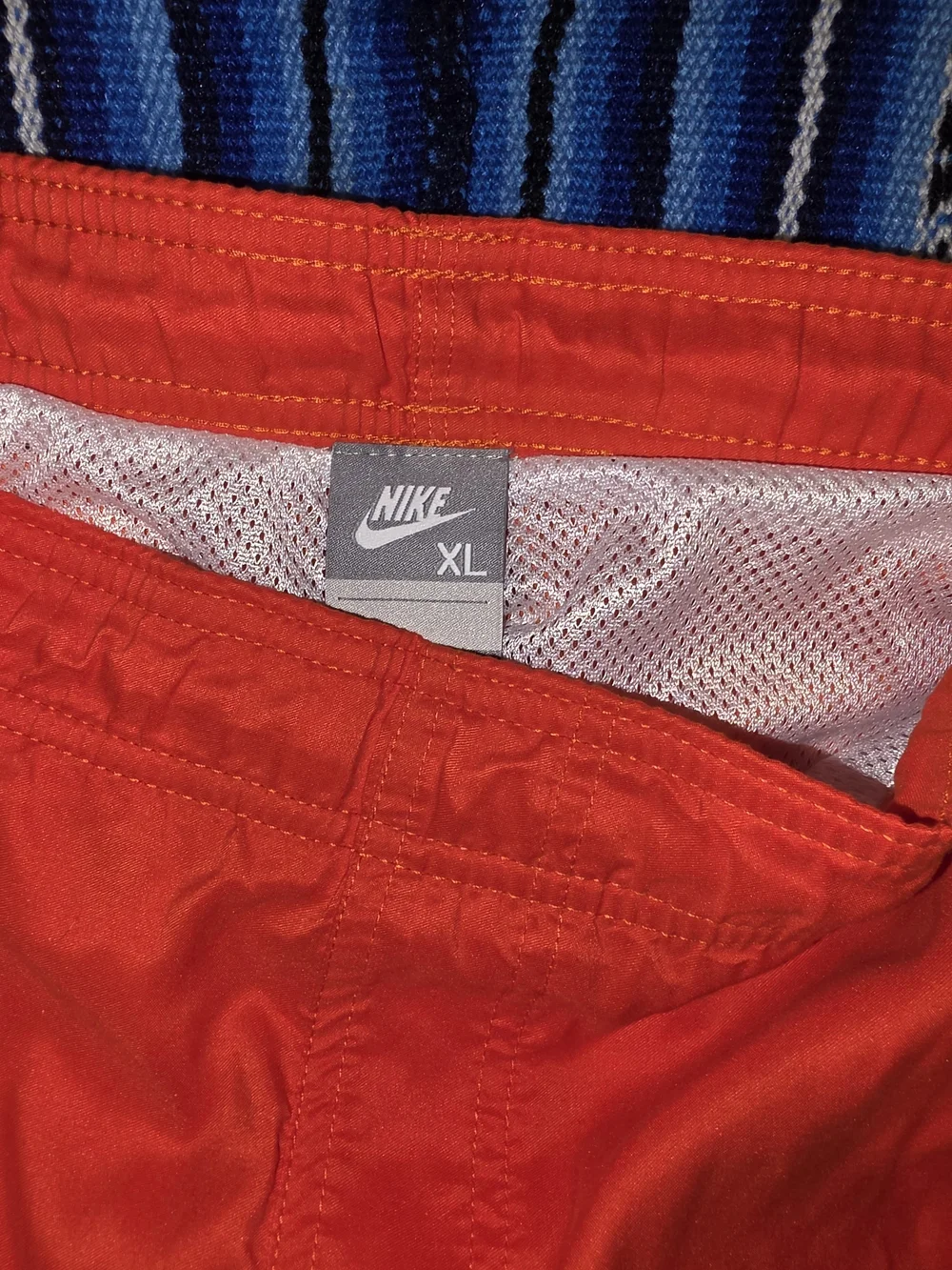 Nike orange storage rising