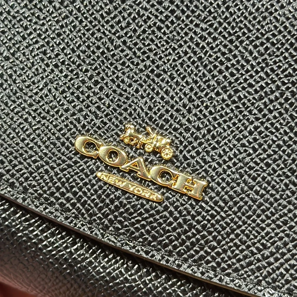 Coach slim envelope