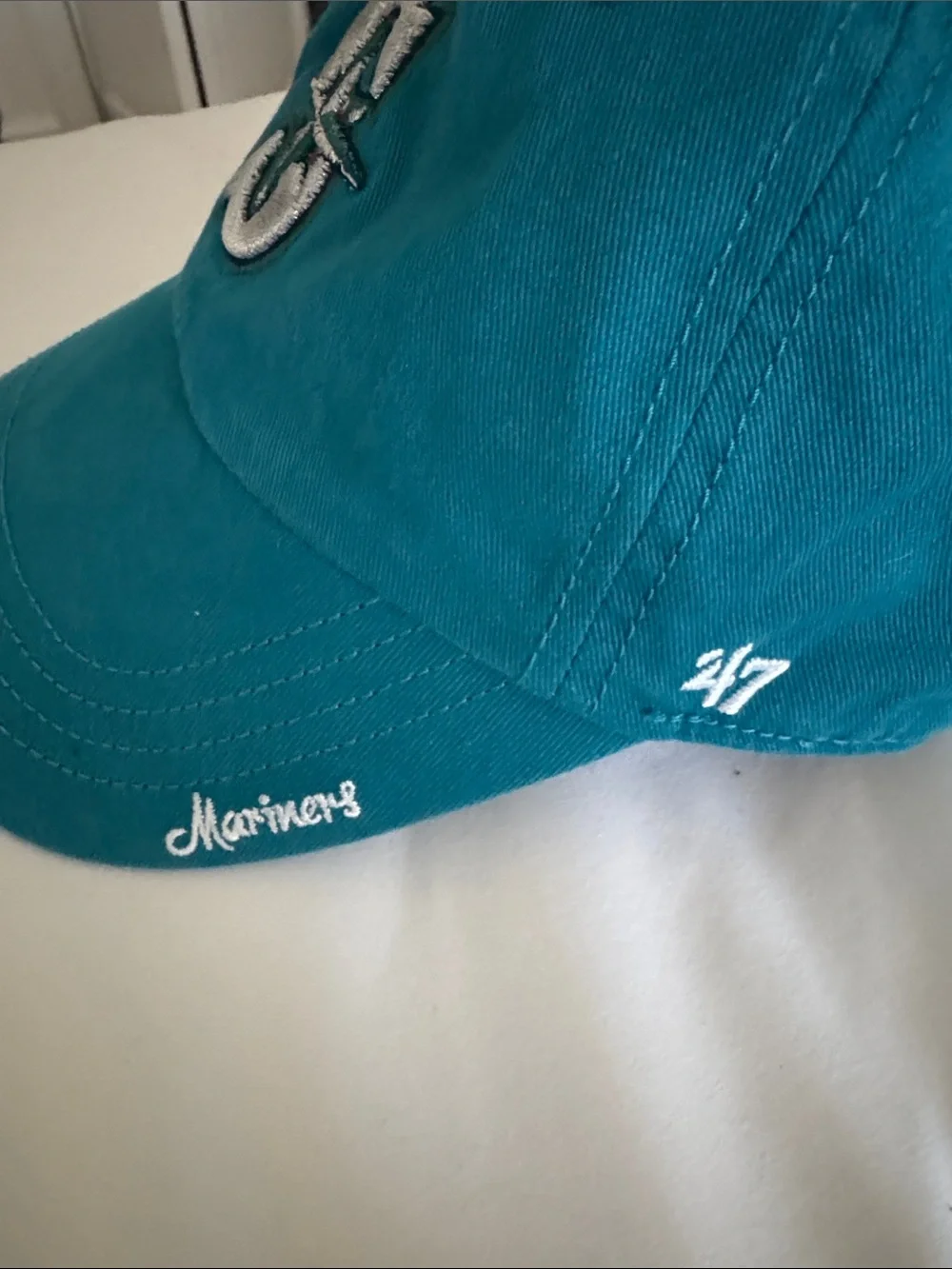 47 curved brim