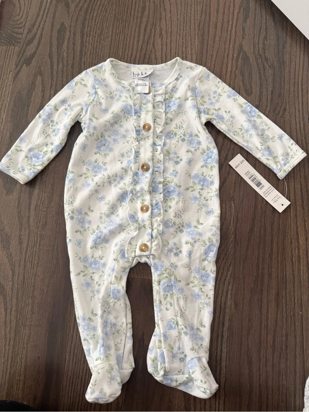 Nicole Miller Pale Blue Floral Ruffle-Front Footed One-Piece