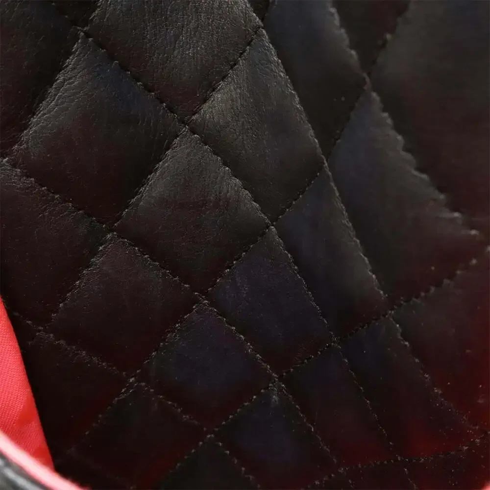 CHANEL black leather