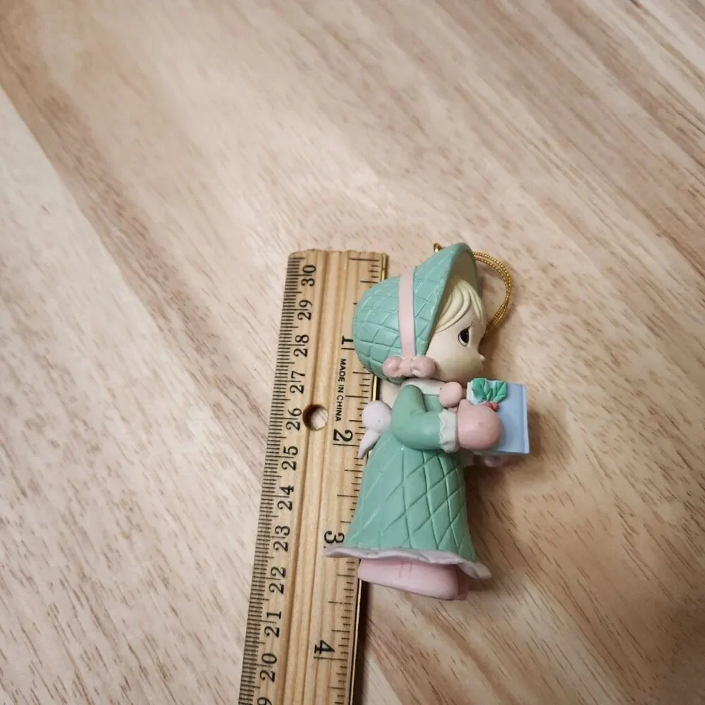 1995 Precious Moments girl singing from song book ornament
