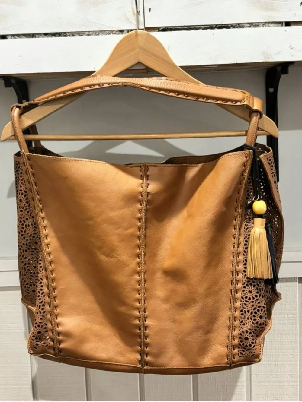 The Sak Laser-Cut Leather Hobo in Cognac