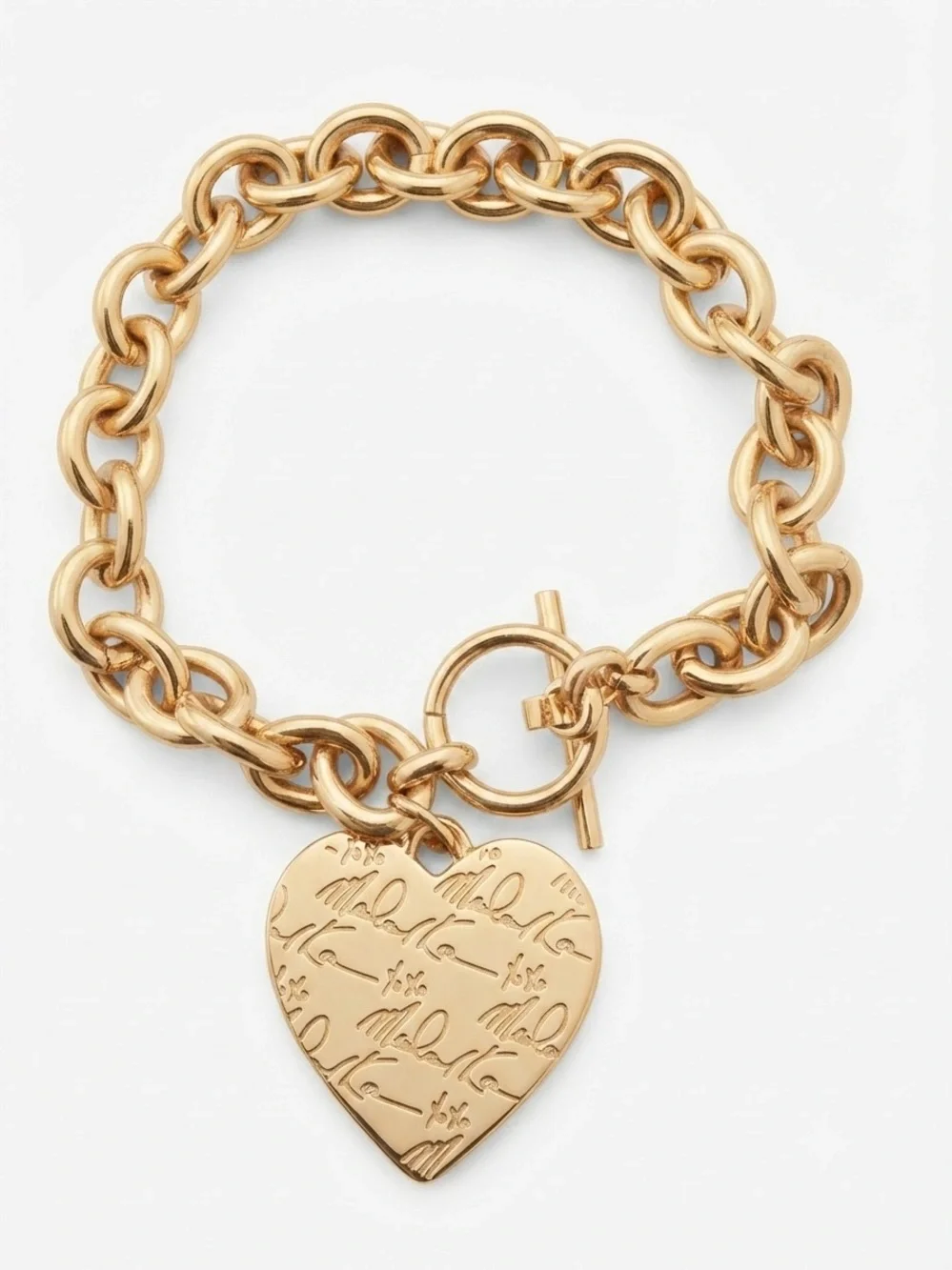 Nice!! Michael Kors Gold Heart Engraved two sided Toggle Bracelet