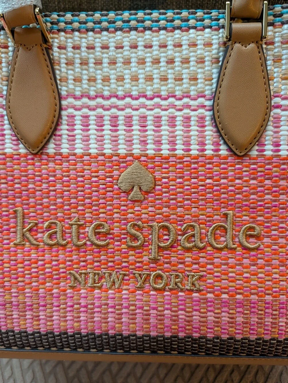 kate spade use plaque