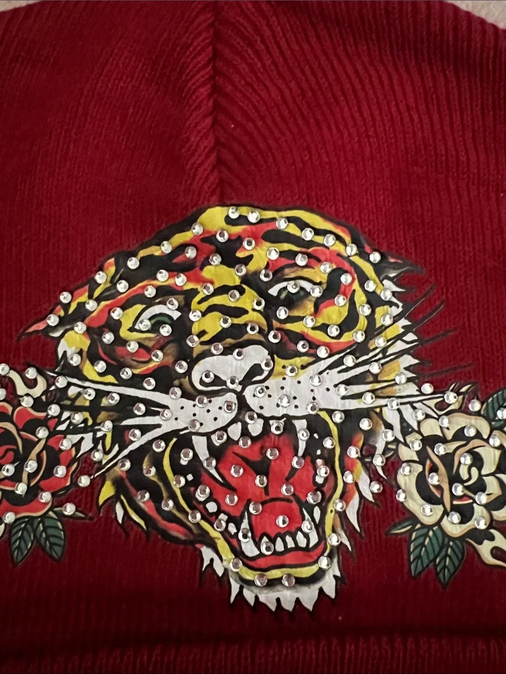 Ed Hardy knit playful featuring
