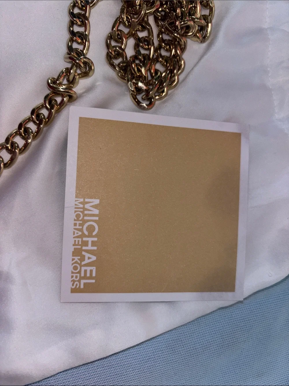 Michael Kors engraved leather