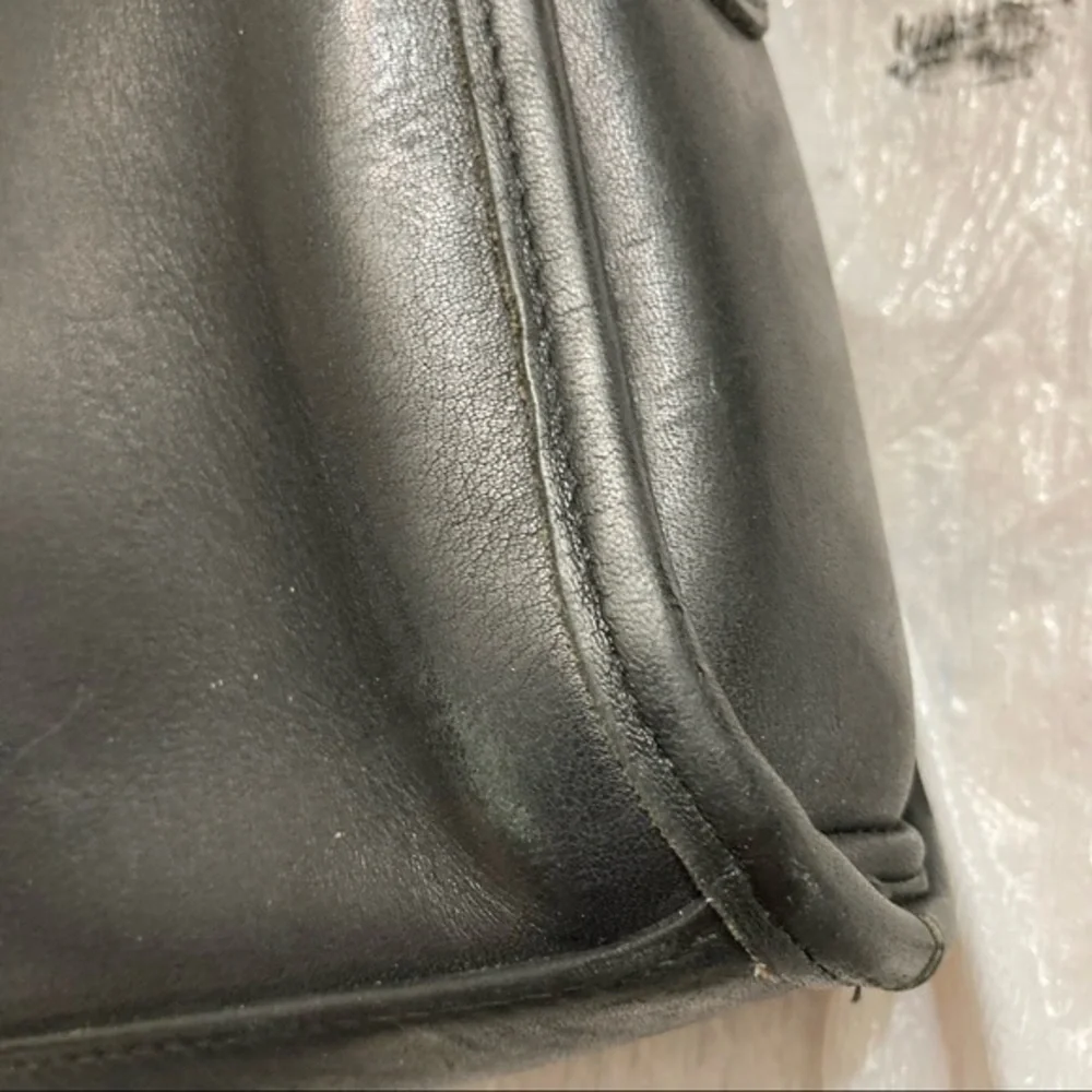 Coach scuffs normal wear