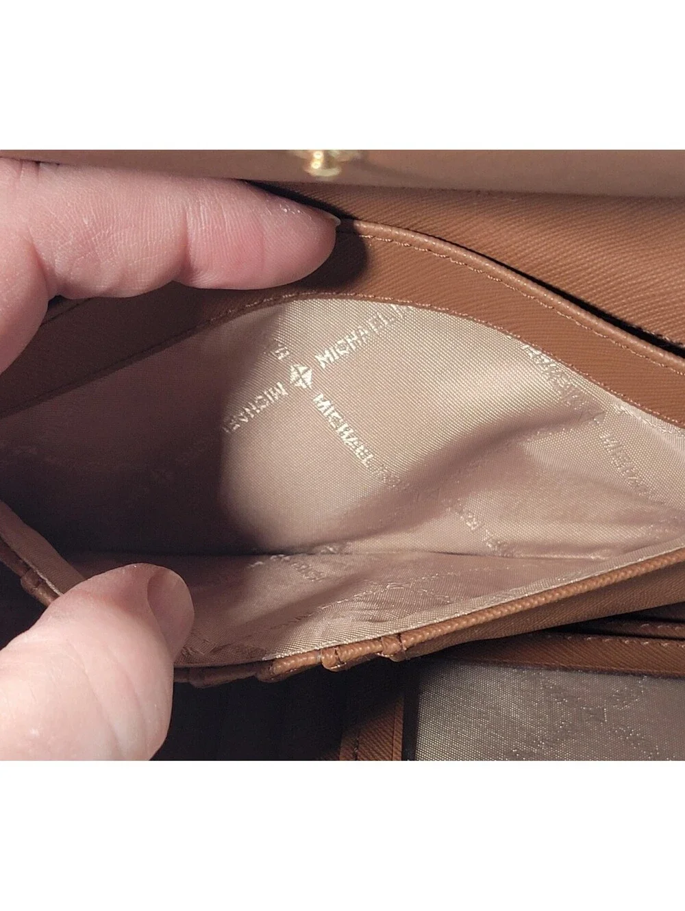 Michael Kors compact forward features