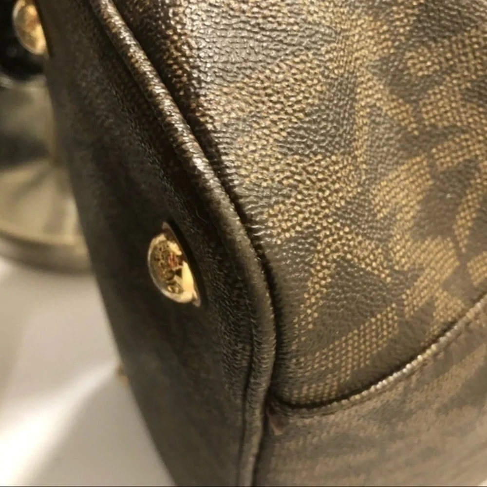 Michael Kors marks straps tiny