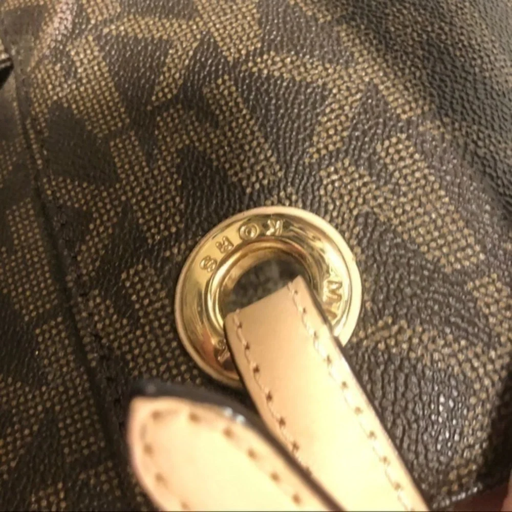 Michael Kors straps wear tiny