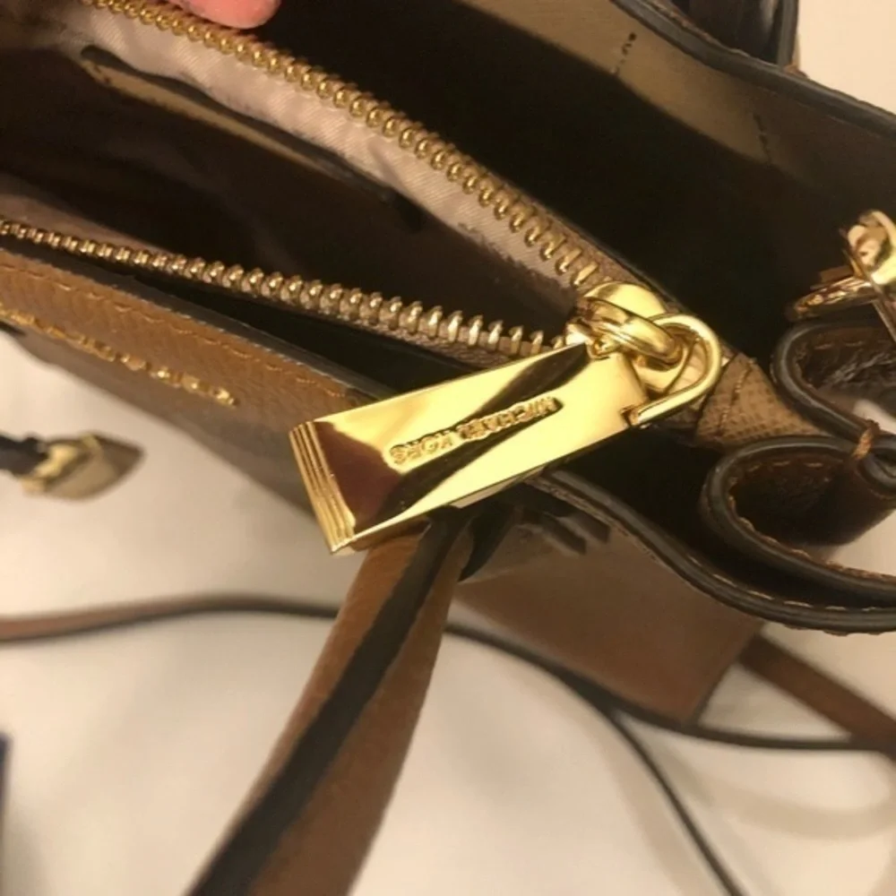 Michael Kors very gently