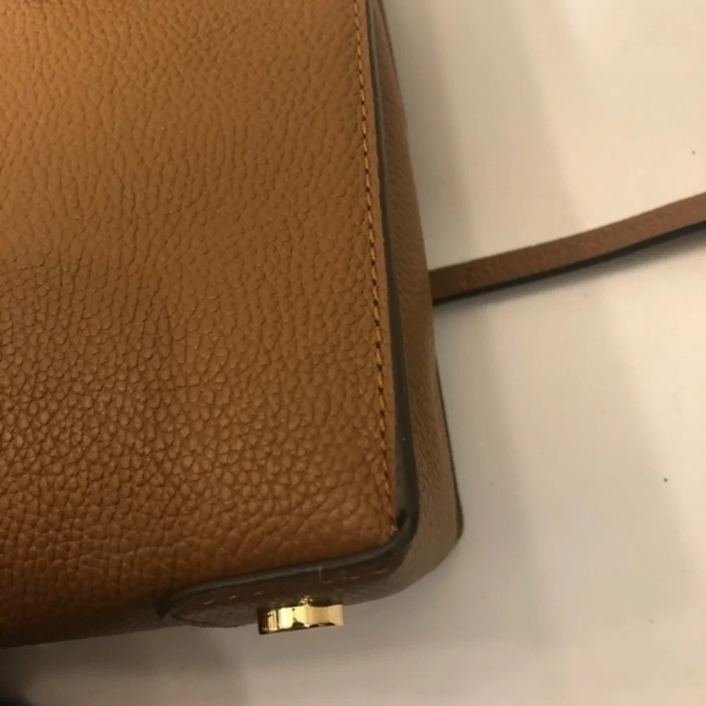 Michael Kors very gently