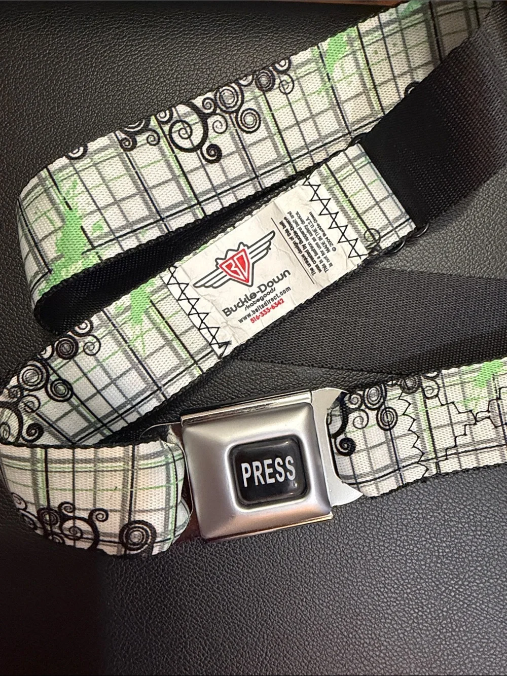 Buckle-Down White & Green Plaid Seatbelt belt with Black Swirl Accents