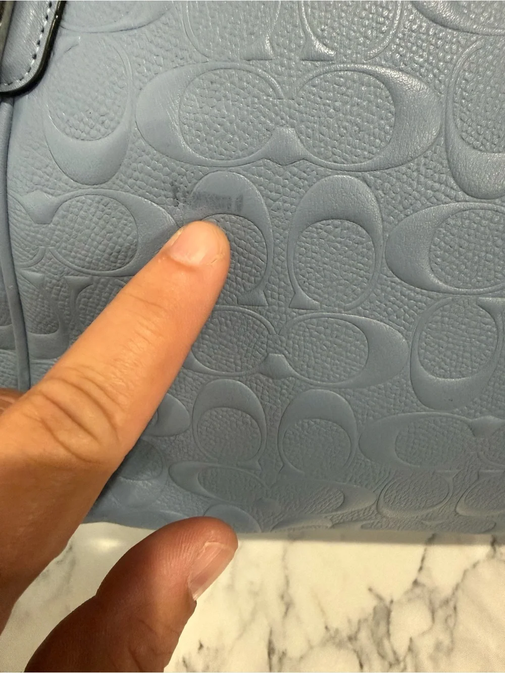 Coach embossed leather
