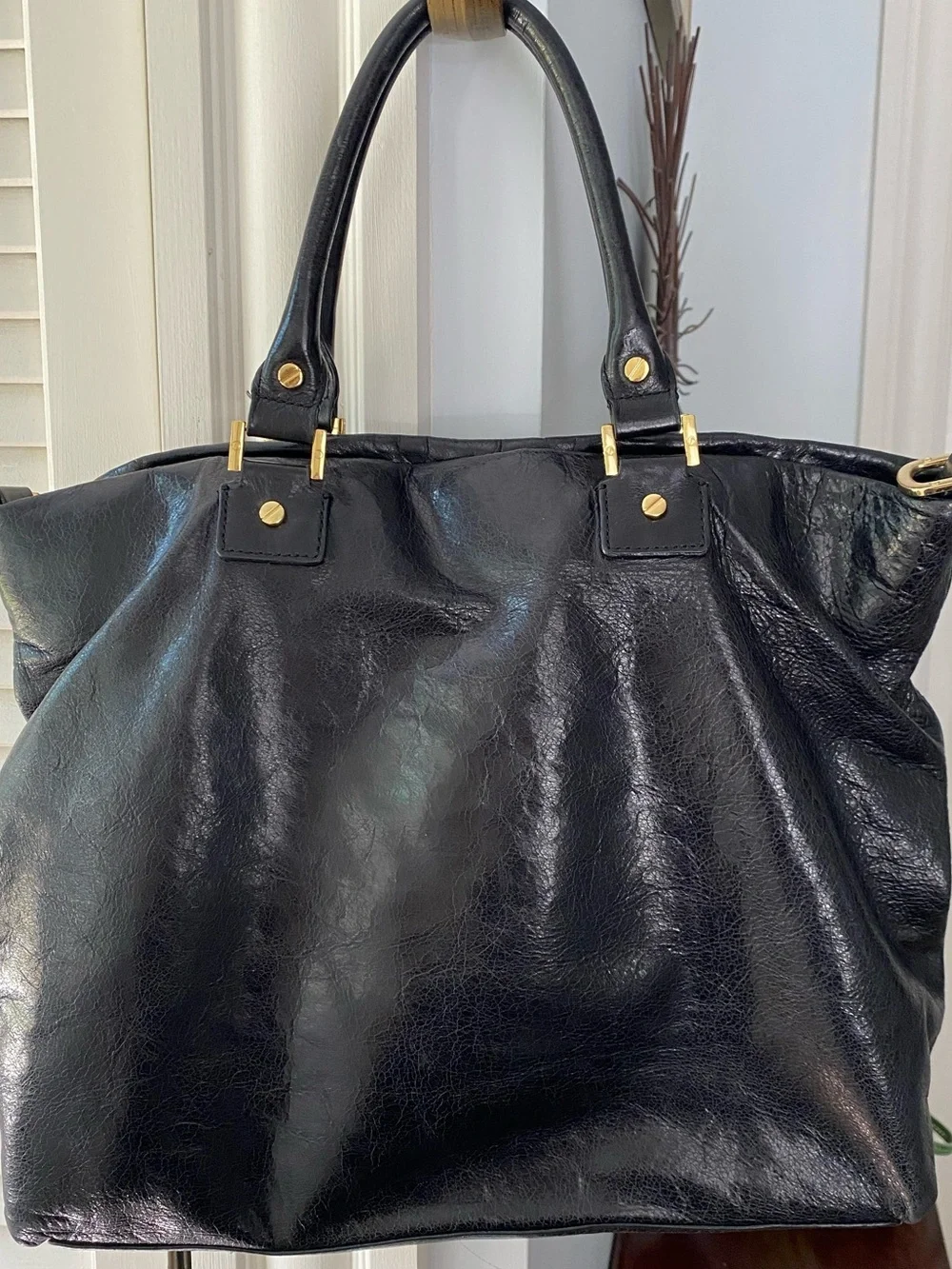 Tory Burch strap closure tiny