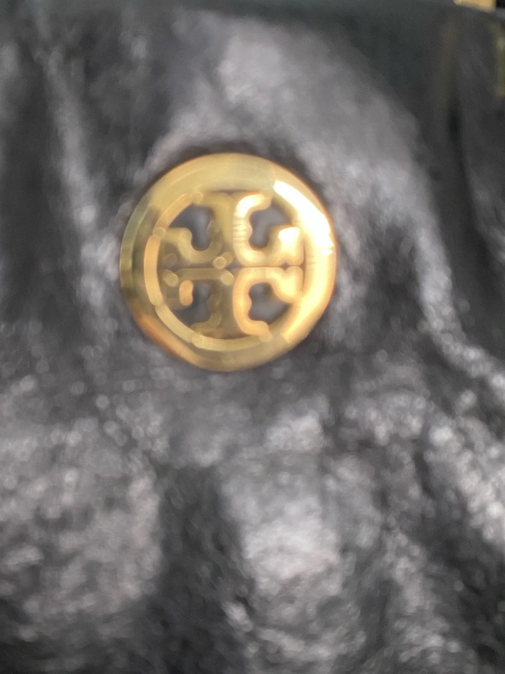 Tory Burch closure clean handles