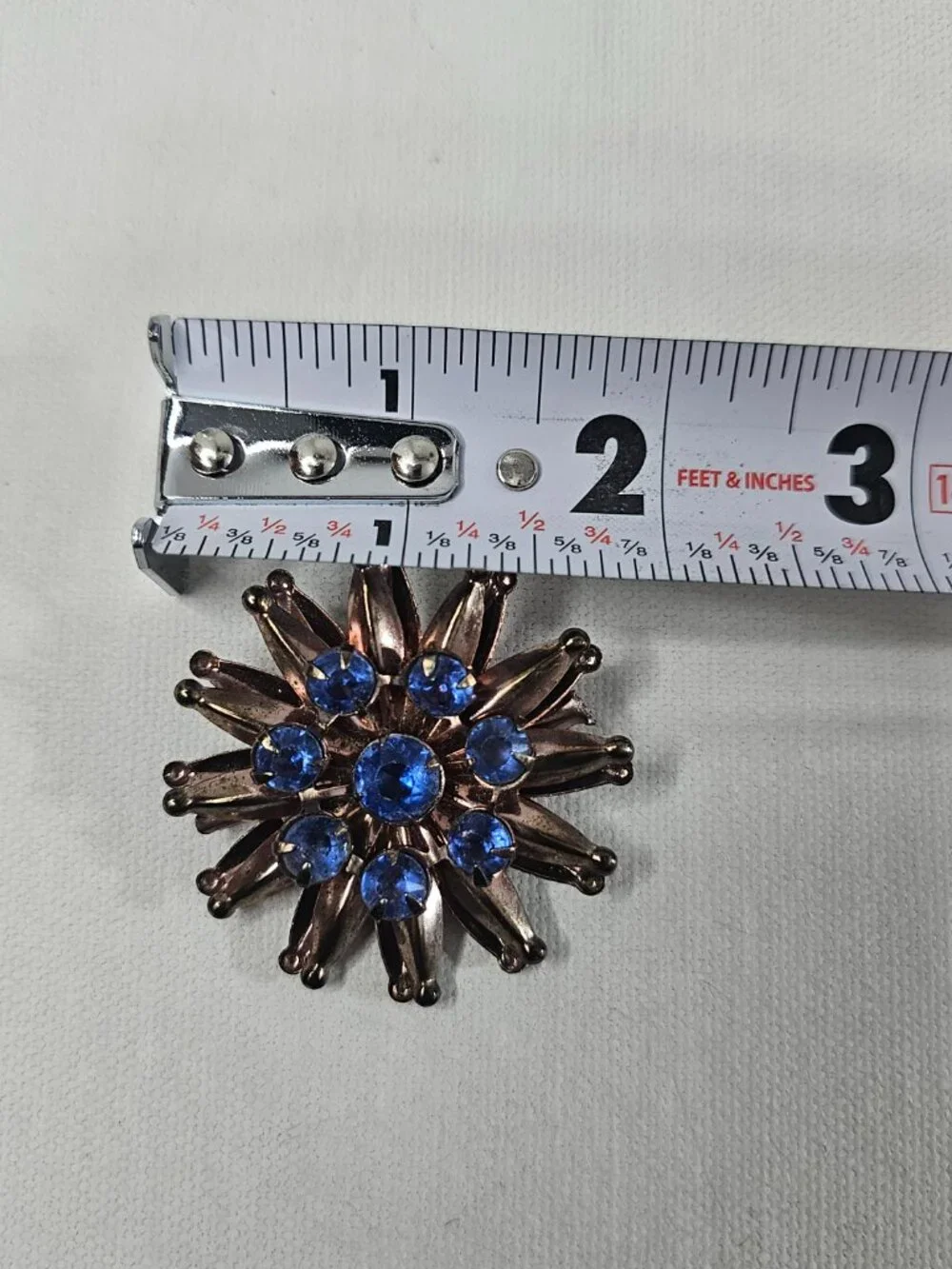 Vintage Atomic Starburst Brooch Blue Rhinestone Bronze Tone Unmarked Jewelry Pin