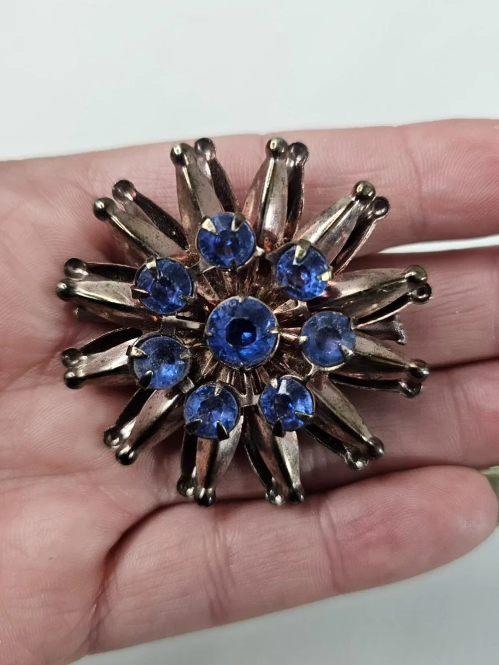 Vintage Atomic Starburst Brooch Blue Rhinestone Bronze Tone Unmarked Jewelry Pin