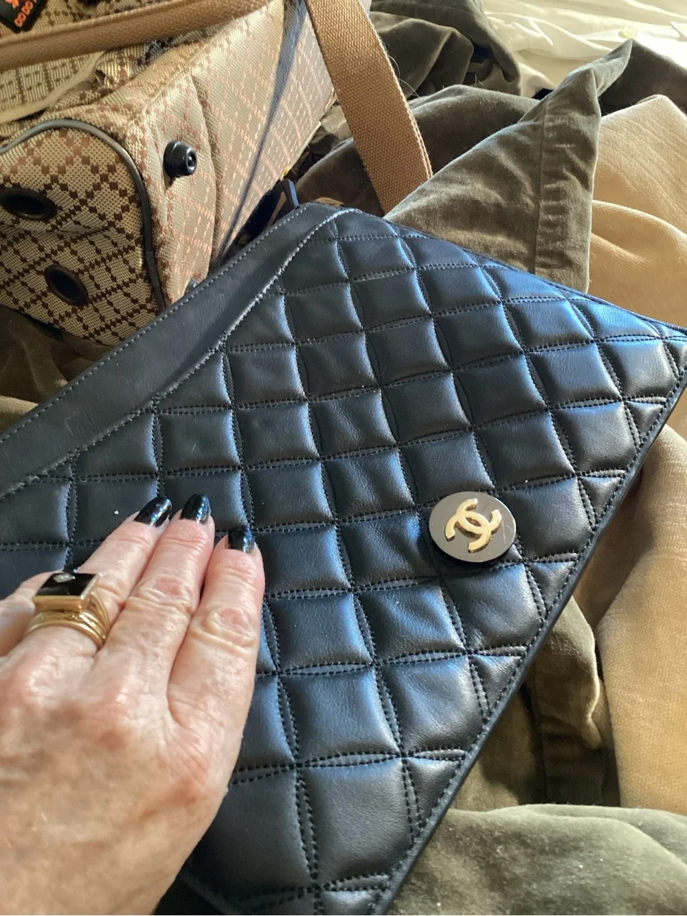 Chanel Quilted Leather Clutch Wristlet in Black with Gold CC Emblem
