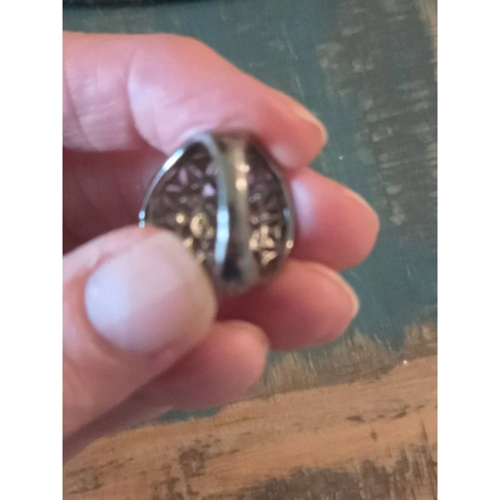 Unbranded ornate silver