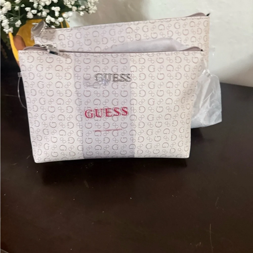 GUESS White and Light Gray Cosmetic Pouch with Red Logo
