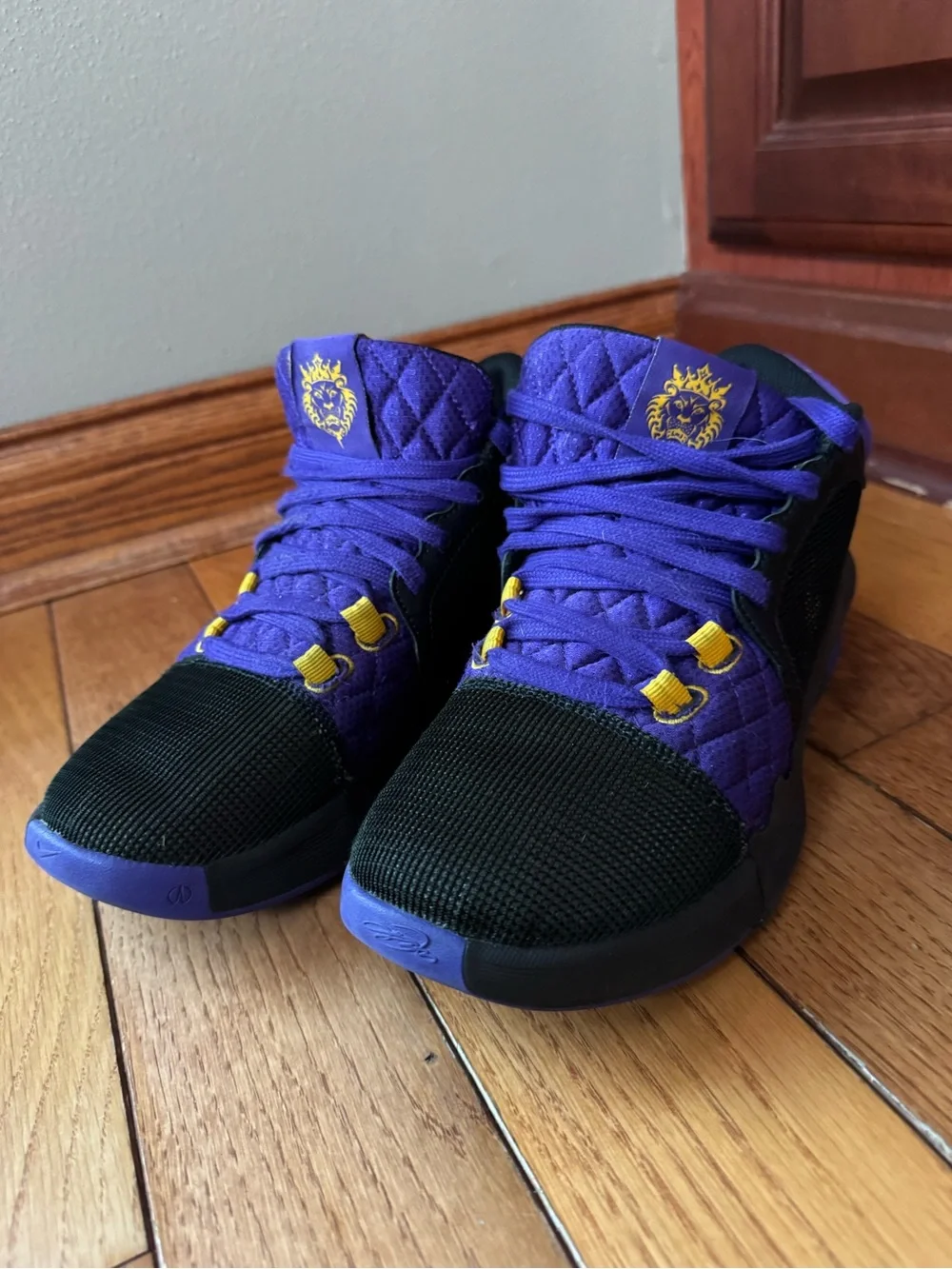 Nike Kids Black and Purple High-Top Sneakers with Yellow Accents