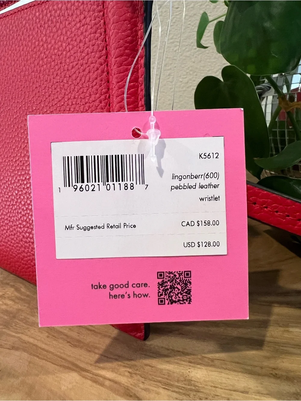 kate spade wrist spade zip