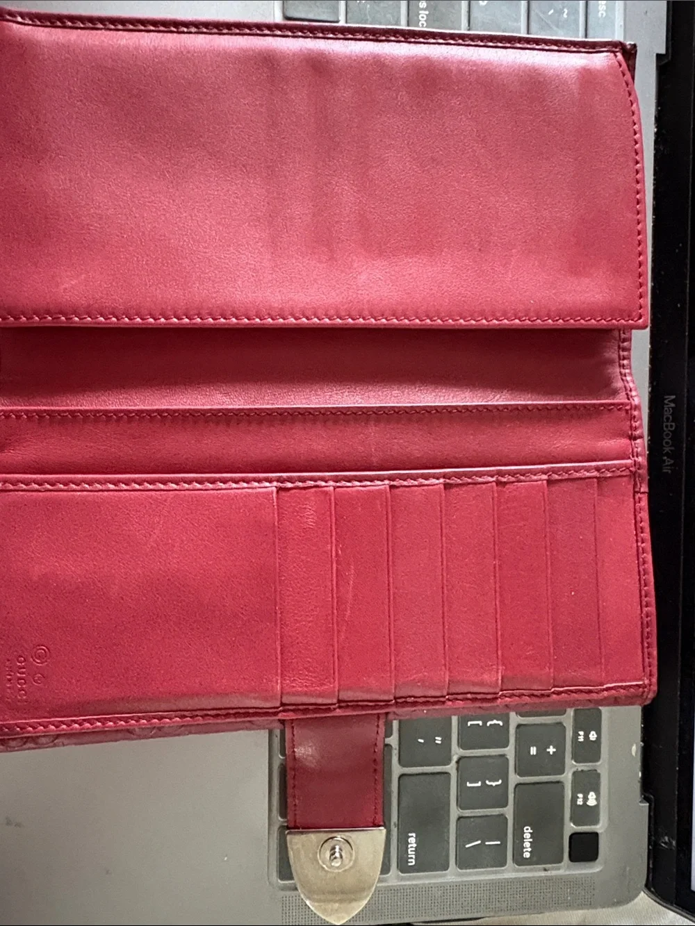 Gucci signature embossed