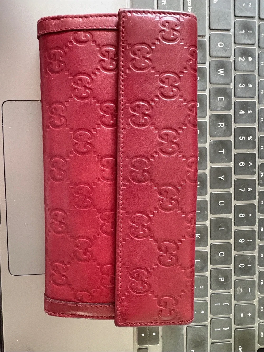 Gucci signature embossed