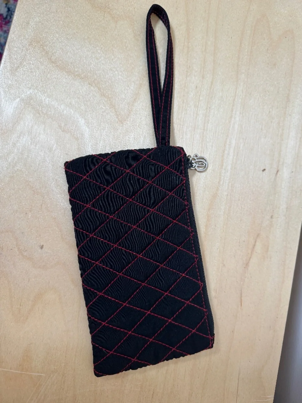 Vera Bradley black wristlet with red stitching, OS