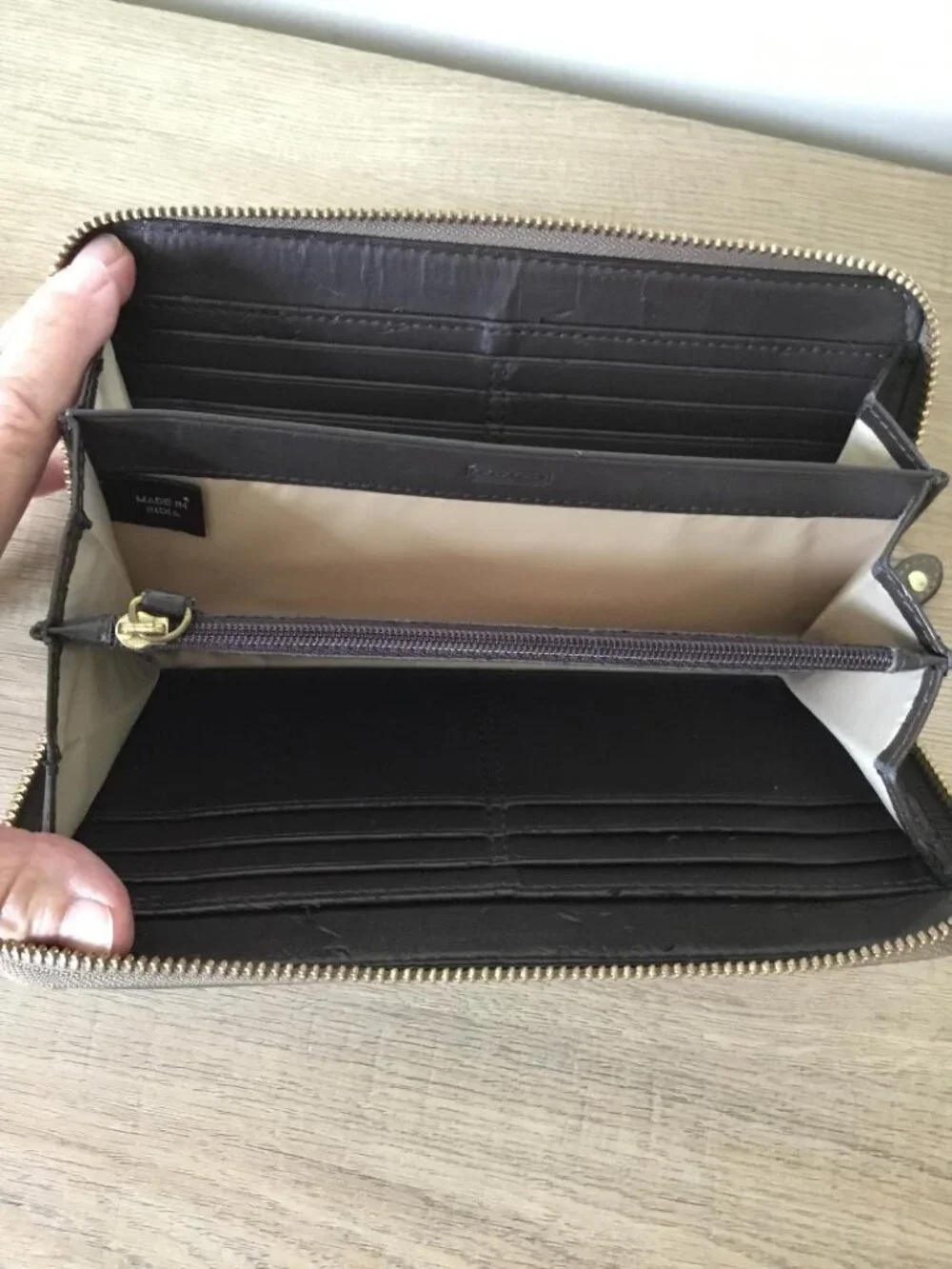 Coach signature zip