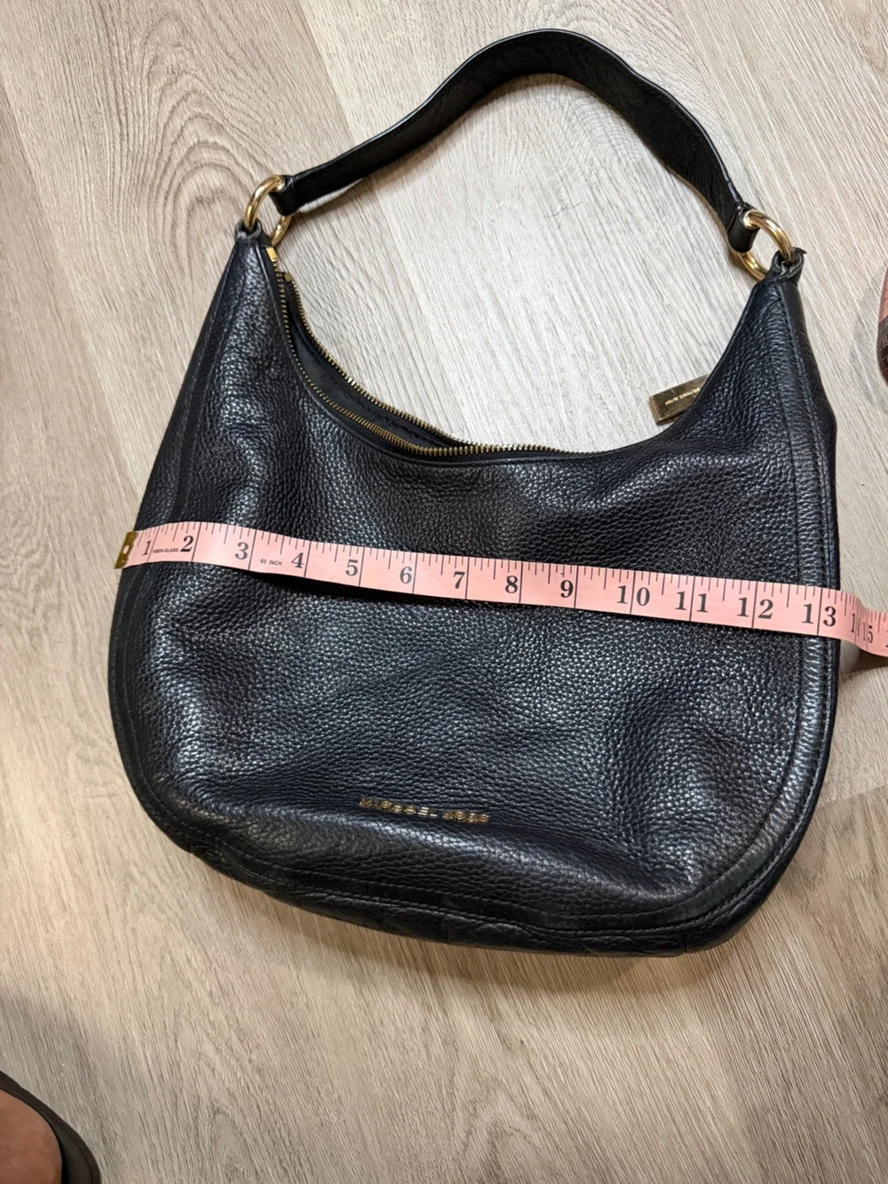 Michael Kors zip gold silhouette