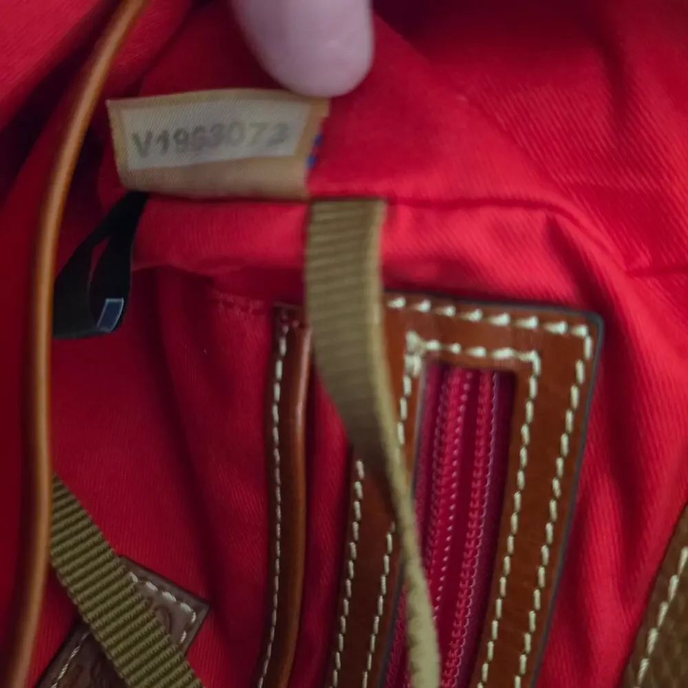 Dooney & Bourke perfect charm closure