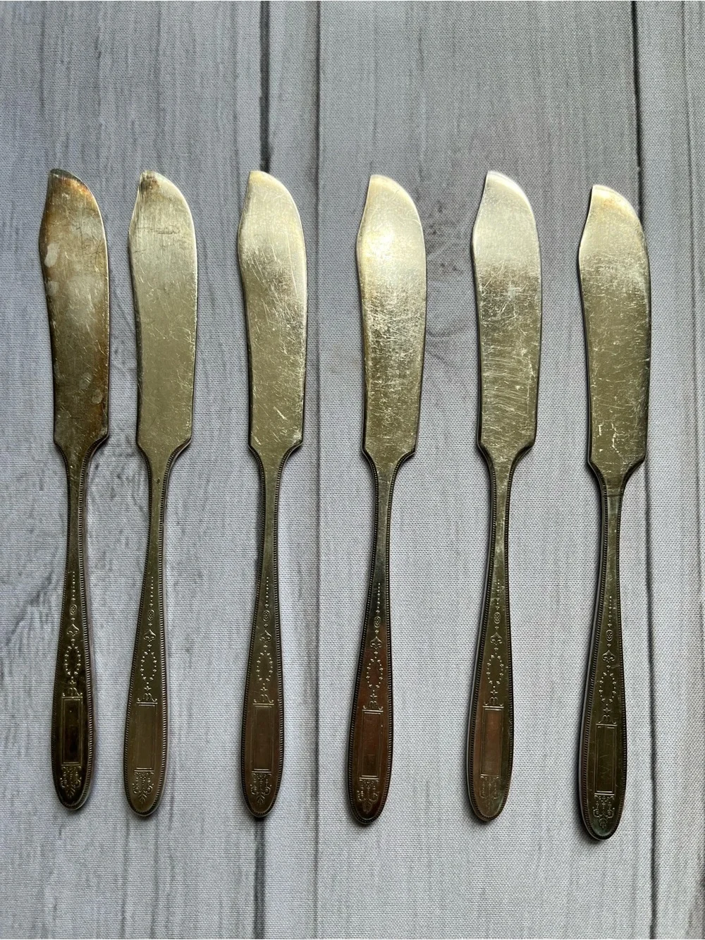 Oneida Grosvenor monograms scratched pre