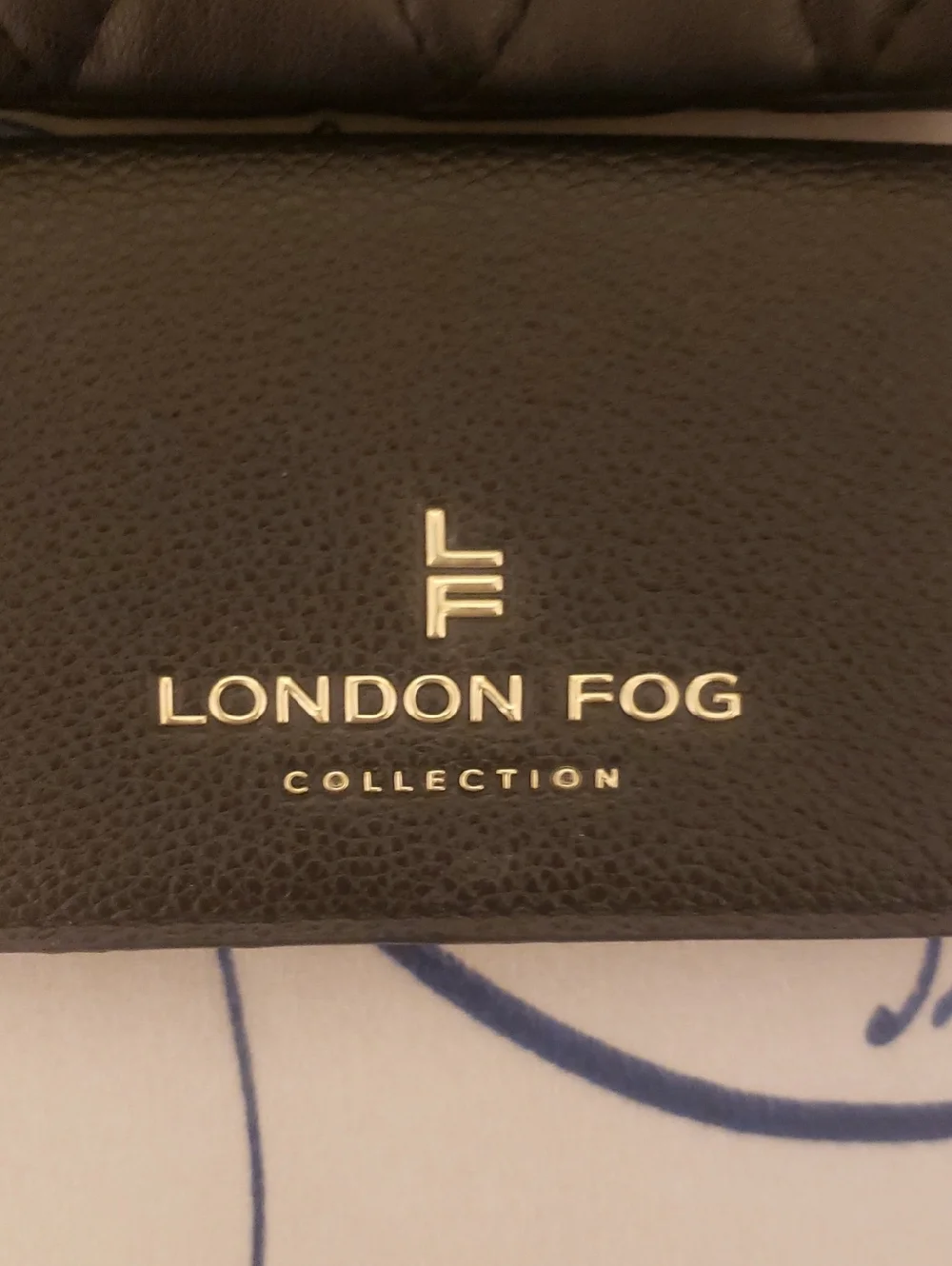 London Fog quilted cosmetic