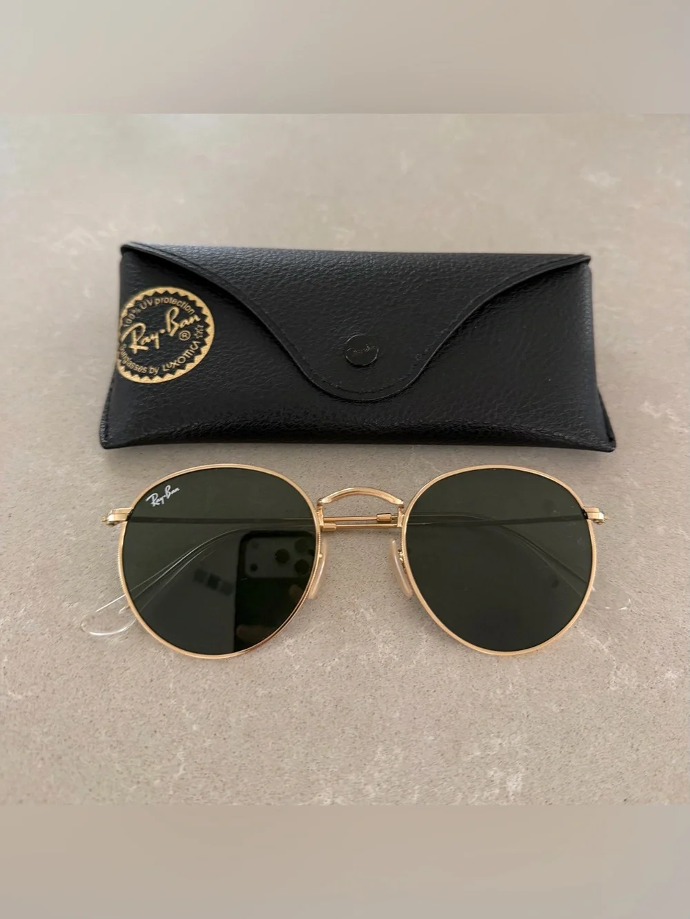 Ray-Ban Gold Frame Sunglasses with polarized lens