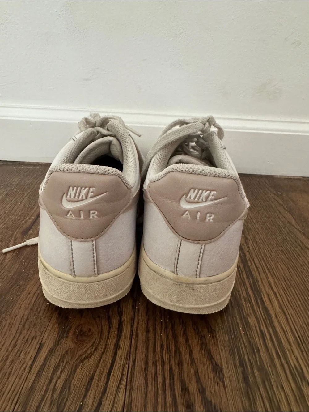 Nike air white sneakers with pink swoosh