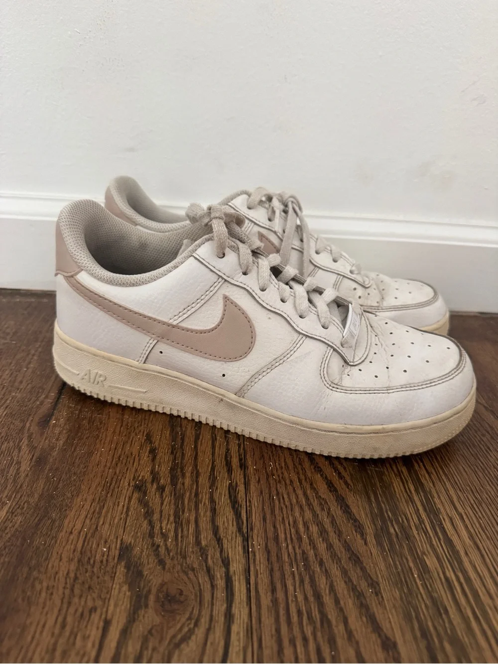 Nike air white sneakers with pink swoosh