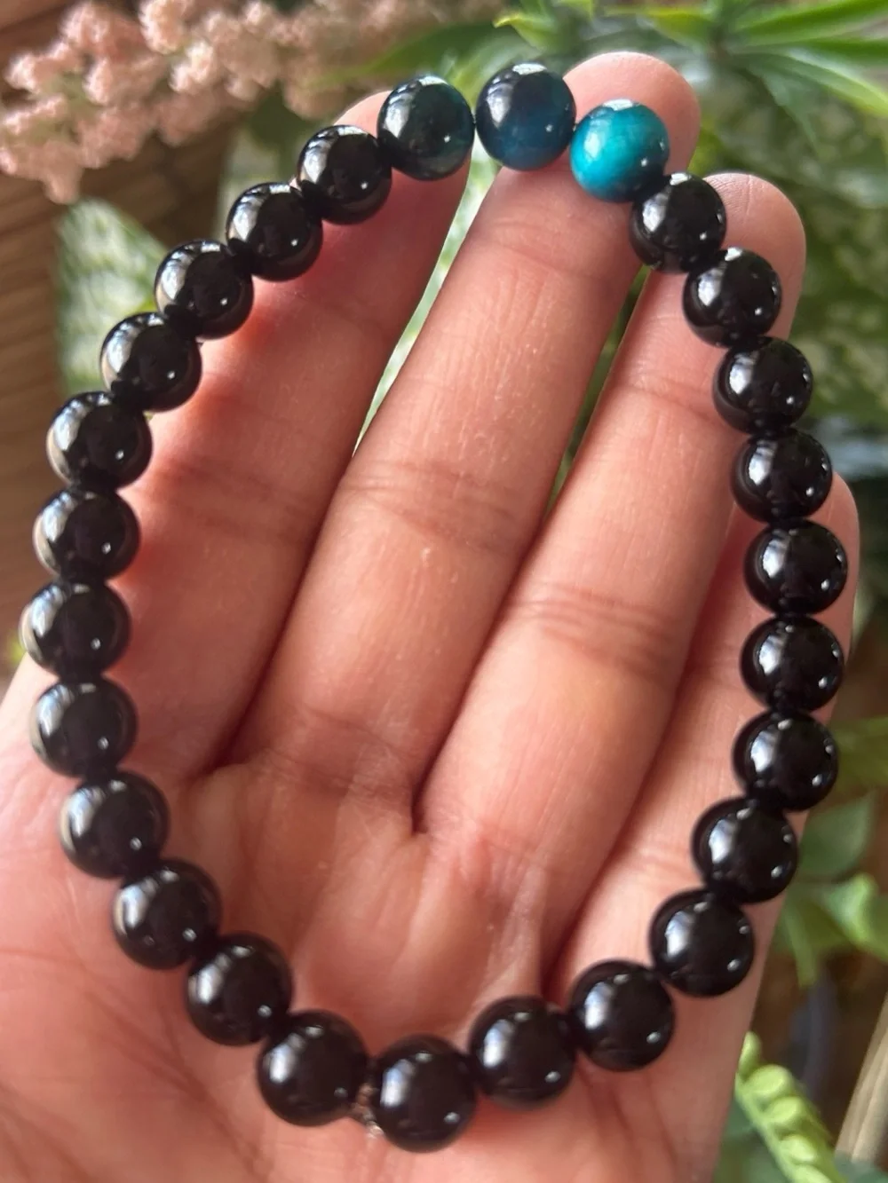 Men’s black tourmaline bracelet with three blue tiger eye accent beads