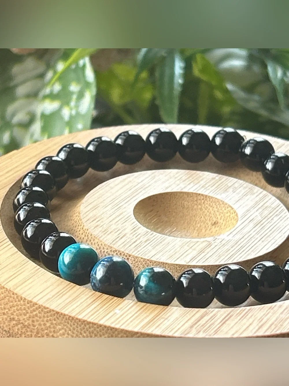 Men’s black tourmaline bracelet with three blue tiger eye accent beads