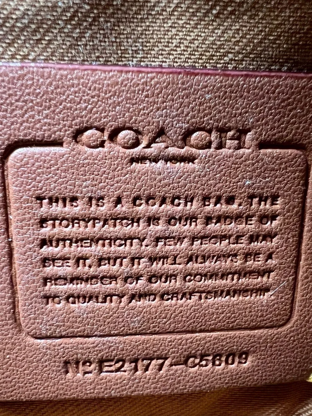 Coach small pebbled