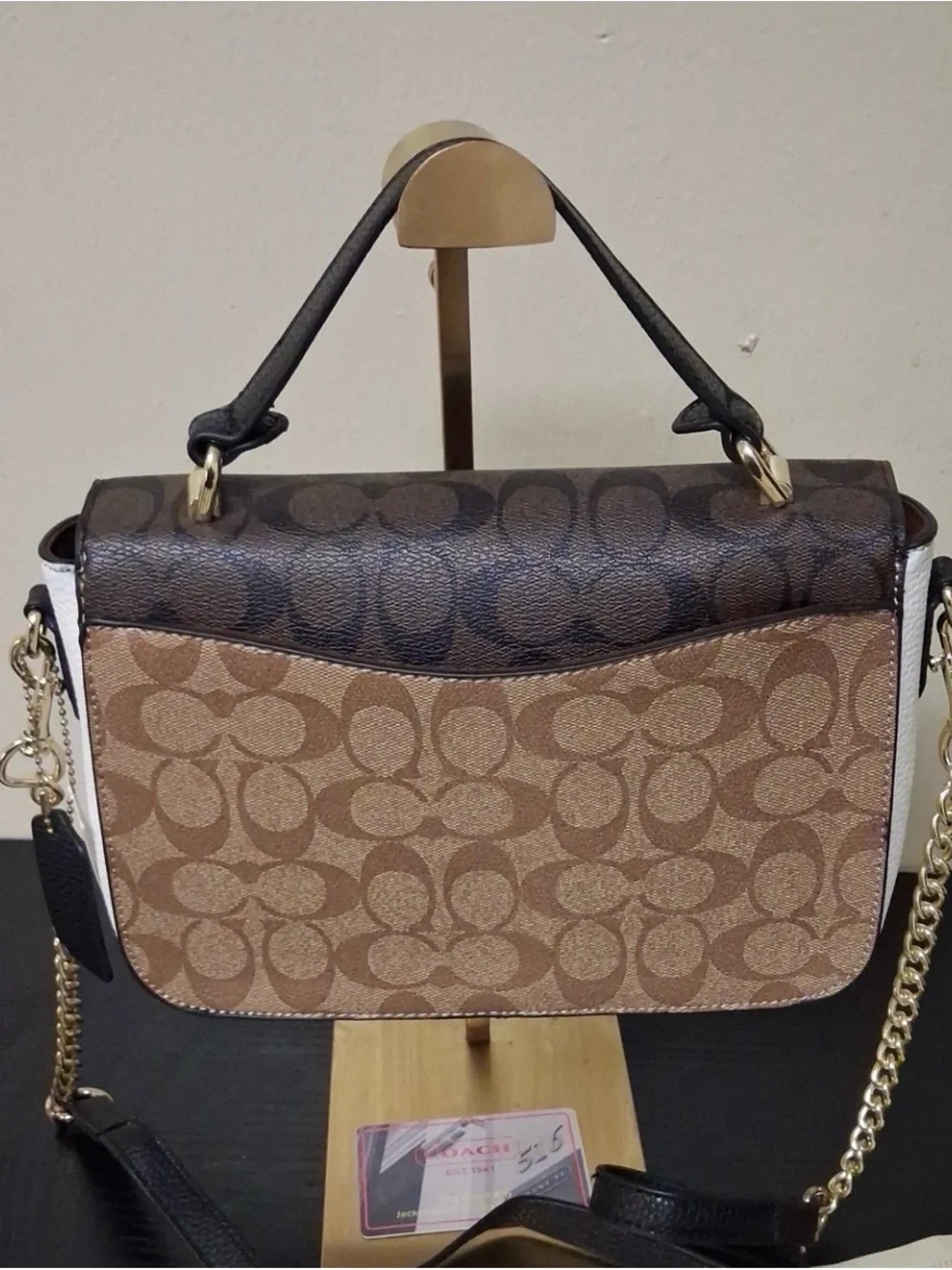 Coach comes authenticity polished